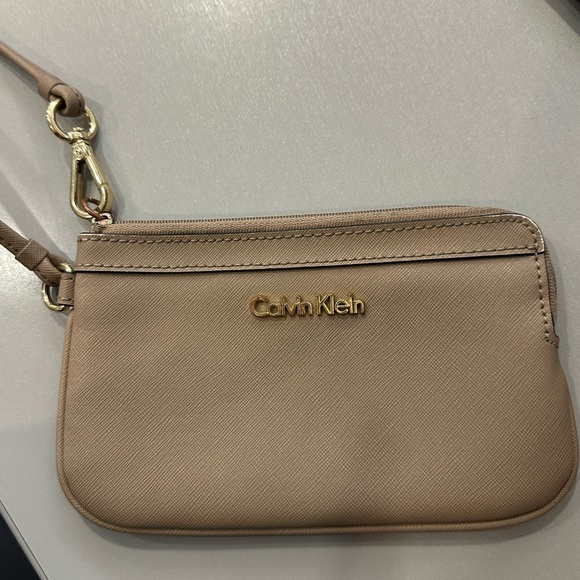 Calvin Klein Women's Large Zip Wristlet is a travel-ready wristlet - Picture 2 of 4